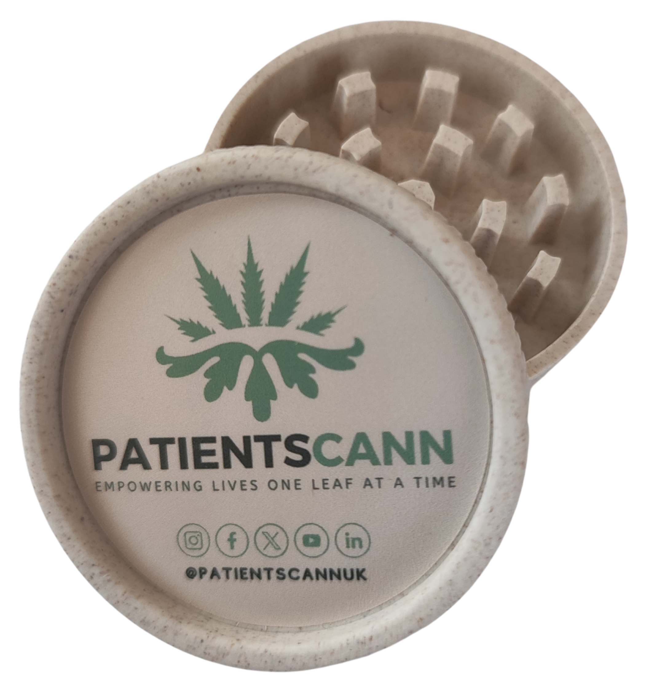 Grinder open showing unground cannabis flower