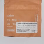 Image of orange packaging of medical cannabis pastilles with dispensing label