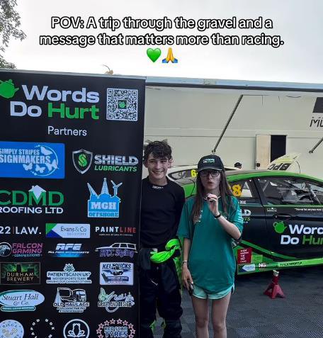 The Words Do Hurt partners backdrop in front of the Thomas Potter Racing cars